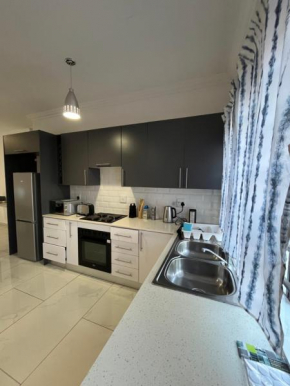 CrownHill Residence Furnished 2-Bedroom Apartment